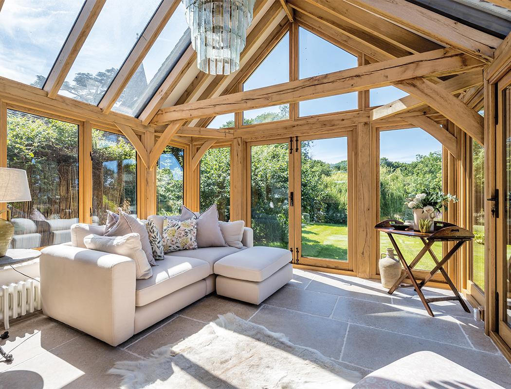 Oak-framed garden room design idea with large glazing, suited to Lancaster's stone homes